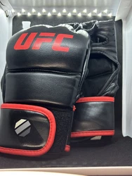 Get your hands on these official UFC MMA grappling gloves for your next training session or fight. Designed with...