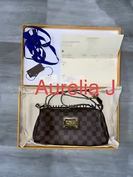 Authentique sac Louis Vuitton Modèle EVA damier ébène Vendu avec facture, dustbag, facture En très bon état :...