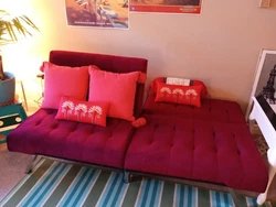 Beautiful sofa opens flat to a x-wide bed. Dark red velvety material. The sleeping size is wider than a twin but...