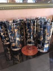 Set of 8 glasses. They are 2 1/2” by 5 1/2”. Definitely a little faded on the black but still a really cool vintage...