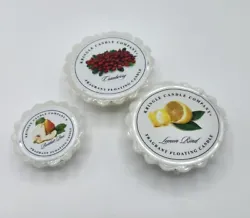 3 Kringle Candle floating style2 large ones (Cranberry, Lemon Rind) and one smaller (Bartlett Pear)New in package