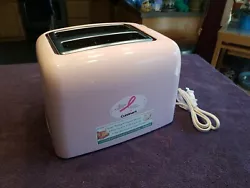 Used toaster as noted. Tested and works great. All 4 elements glow. There are a few crumbs inside. On the back there is...