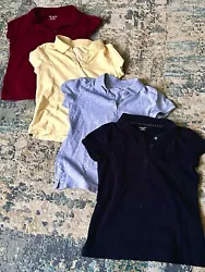 Set of 4 girls short sleeved polo shirts.  Burgundy, butter yellow, gray and black.  3-button top, perfect for school...