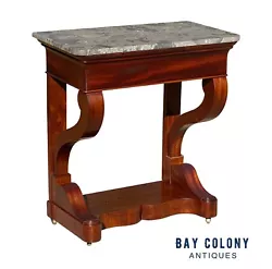 The table exhibits a rare diminutive size and is perfect for that hard to furnish spot. There’s a single drawer...