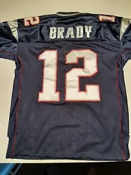 Tom Brady #12 New England Patriots Jersey Reebok On Field Size 50 all emblems stitched. New W/O Tags never worn. ...