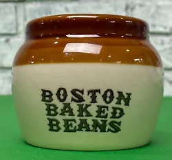 This Vintage Boston Baked Beans Small Crock Pot / Jar is a charming addition to any kitchen collection. The round shape...