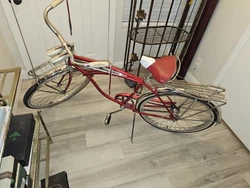 Chrome plated front and rear luggare carriers, streamlined tank with built-in horn, handlebar mounted headlight,...