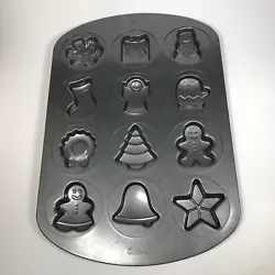 Wilton christmas cookie pan non stick 12 different cookies.