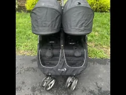 Stroller fully reclines. This double stroller fits through any standard doorway and folds easily with the signature...