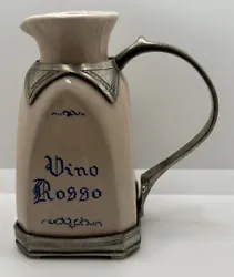 Vino Rosso red wine carafe ceramic hand painted with pewter base, handle, and surround ding skeleton. It is lead free...