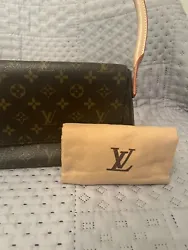 Super Cute Louis Vuitton shoulder bag brown monogram style. Pre-owned passes all inspections for authenticity. Has...