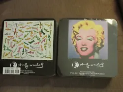 These are two nice Andy Warhol collectibles at a very fair price to compensate for the ding in the Marilyn tin box. The...