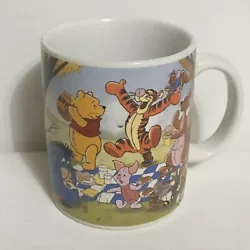 Winnie the Pooh Coffee Mug with Tigger, Rabbit, Eeyore, Owl, Kanga, and Piglet. Great Condition.