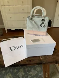 Christian Dior Lady Dior Bag Cannage Quilt Patent Medium. Limited edition with light blue and pink. Bought it at one of...