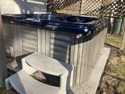6 person Hot Tub - Mira M7000, navy interior, grey exterior. Back-lit jets..