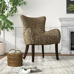 Sleek and stylish leopard print upholstered fabric accent chair. Flared Arms. Ottoman Included. Animal Print. Arms...