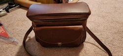 The manual is included. Argus flash with cover. There are no issues with the bag. Kodak lens cleaning paper. You get...