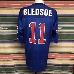 Show your love for the New England Patriots with this vintage blue Drew Bledsoe Champion jersey. Perfect for any NFL...