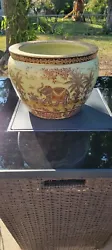 Large porcelain koi fish bowl jardiniere planter. Im going to assume it was produced in china. Bottom reads handmade...
