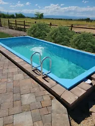 rectangular above ground swimming pool, plunge pool, container pool, in ground. Condition is 