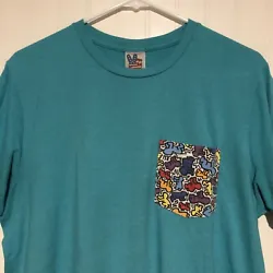 Rare Keith Haring Art Pocket T Shirt. Size Mens Medium. Hardly ever see this graphic for sale. Nice shade of blue -...