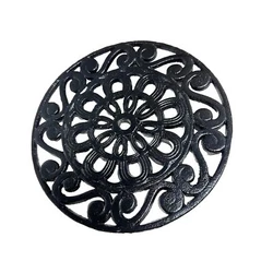 Made from cast iron and weighs 2lbs. Includes rubber feet on the bottom to protect surfaces.