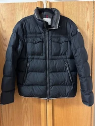 Pre-Owned and used, no holes or large marks.