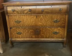 Antique Carved Wood Dresser with 4 (four) Drawers and Ball & Claw Feet. Condition: Good/antique. Overall light wear. An...