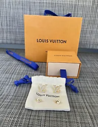 Great condition Louis Vuitton stud earrings! Only sign of wear is a slight bend in one of the earring poles. Comes with...