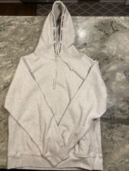 This authentic Supreme hoodie in gray is a must-have for any hip hop fashion lover. Made from high-quality fleece...