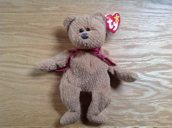 Mint condition Retired Ty Bear Curly. The Bear is in excellent condition with MANY errors! I will do my best to point...