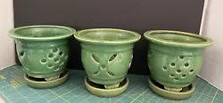 Enhance the beauty of your garden with this lot of 3 glazed ceramic orchid flower pots with attached saucers. These...