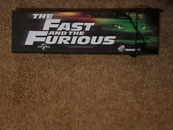 Elevate your arcade gaming experience with this Arcade1up marquee featuring The Fast & The Furious Deluxe game title....