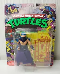You are buying a new, unopened Teenage Mutant Ninja Turtles Shredder Figure Classic Retro Playmates 2022 Toy. Refer to...