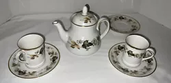 Royal Doulton England Larchmont teapot cups and saucers. One teapot with cover 3 saucers 2 cups. Appear in good...