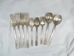 9 pieces include 4 forks, 2 teaspoons, 2 soup spoons or serving spoons and 1 grapefruit spoon. The backs of all...