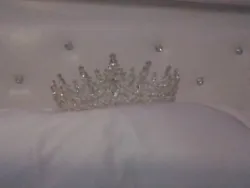 tiaras crowns for women white. Im selling it cause i dont need it. Its in perfect shape no diamonds missing.