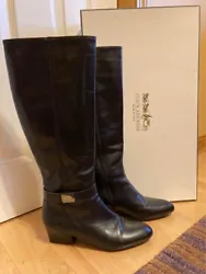 A modern take on a classic style, these tall black boots by Coach and Four are stylish, comfortable, and in excellent...