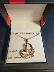 18 KT Gold Flash Plated Heart Necklace. NIB. Boxed for gift giving. Pendant has a glittery affect. Cubic zirconia...