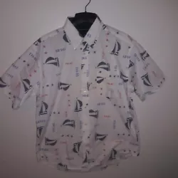 Mens Tommy Hilfiger All Over Print Button up shirt. Size L in good Used condition. See Pics!