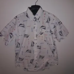 Mens Tommy Hilfiger All Over Print Button up shirt. Size L in good Used condition. See Pics!
