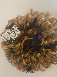 • This is a Brand new Halloween Mesh Wreath. I used a very pretty Black and orange deco mesh on a wire frame. I hand...