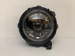 Up for sale is a good working part. It is a right passengers side headlight. This is a genuine authentic OEM JEEP part....
