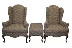 This set features fully upholstered chairs with welting and loose seat cushions. The legs are a cherry Queen Anne...
