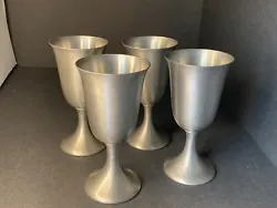 This is a set up for vintage wine goblets they have been used quite a bit. There are scratches quite a bit of markings...