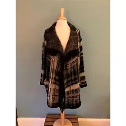 Fun and cozy! BCBGMaxAzria long open beige & black fringed cardigan size medium with 2 front pockets. Material...