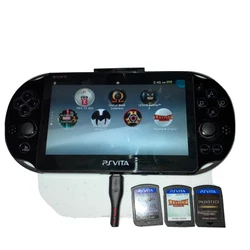 Sony PlayStation PS Vita PCH-2001 Console + Charger & 3 Games Batman Injustice. Console has been tested works great,...