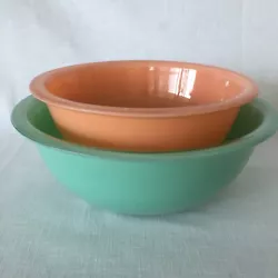323 1.5 Liter. Height 3 3/8” Diam 8 3/8”Peach. Two Clear Bottom Nesting Bowls. Colors and finishes still vibrant...