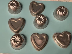 7 Mini Vintage Jello Molds these are aluminum not copper. Lighting gives copper type glow