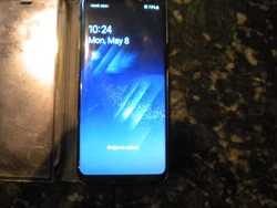 nice phone with case      small chip bottom left     almost unnoticed